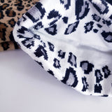 Leopard knitted hat with Black POM POM